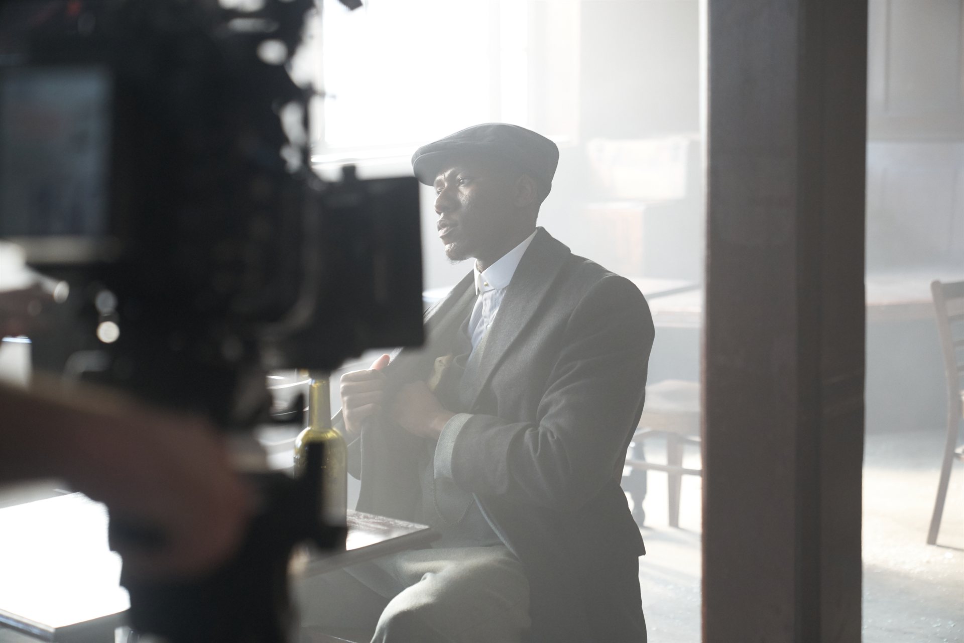 Delasi on set — behind the camera